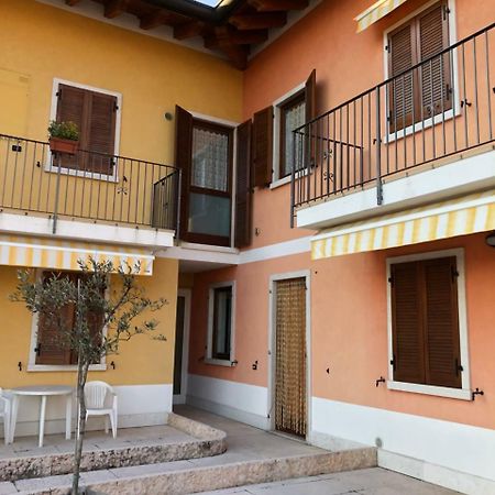 Magia Del Garda Apartment Castelnuovo del Garda Bagian luar foto